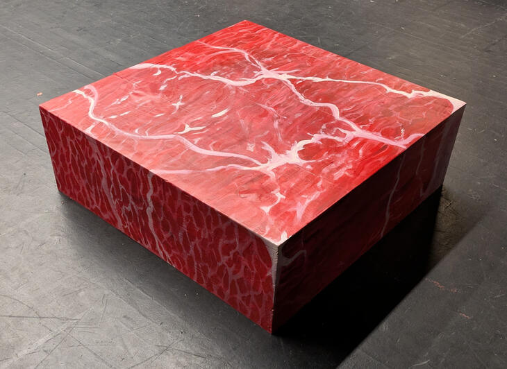 3ft by 3ft by 1ft wooden box painted like raw meat