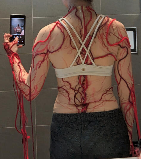 Custom bodysuit, hand embroidered, mapping my chronic pain, back