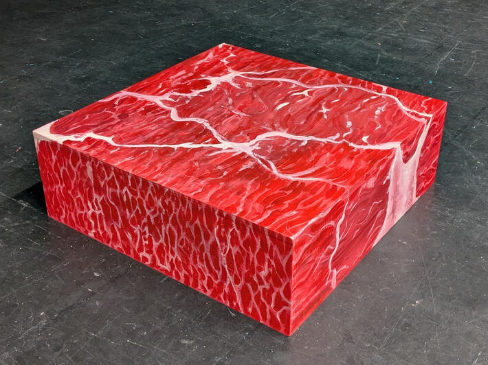 3ft by 3ft by 1ft wooden box painted like raw meat
